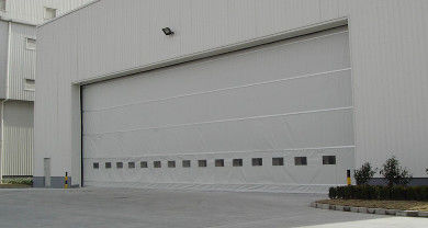 Αγορά Δυνατότητα Βιομηχανικό ύφασμα Βερτικάλες πόρτες ύφασμα ανελκυστήρα με μέγιστο ύψος 12 μέτρα και αντοχή στον άνεμο έως 120 Kmh Ιδανικό για αποθήκες online manufacture