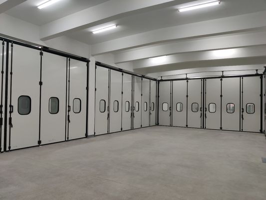 Προσαρμοσμένες γκρίζες αναδιπλούμενες πόρτες χωρίς κινητήρα με χάντζες χυτοσιδήρου